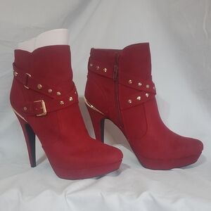 Chic Red Heeled Boots with Gold Studs